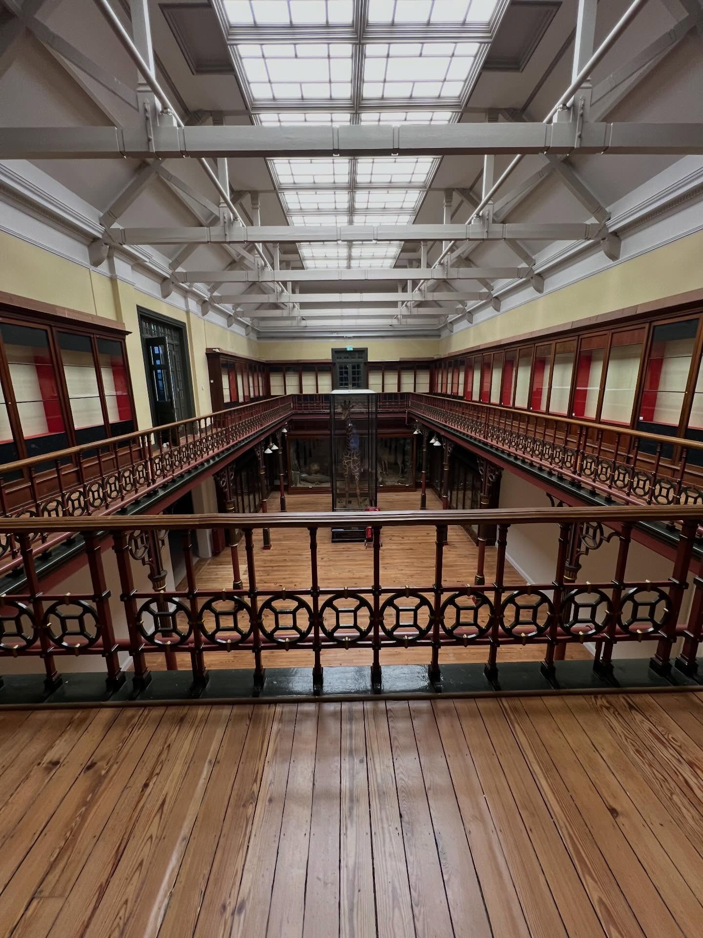 A carefully finished interior with timber floors, rooflights and ornate balustrades